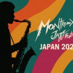 モントルー・ジャズ・フェスティバル・ジャパン2025の夜のステージ風景。ネオンライトと観客のシルエットが交差する都会的なジャズフェスの雰囲気を表現した画像。